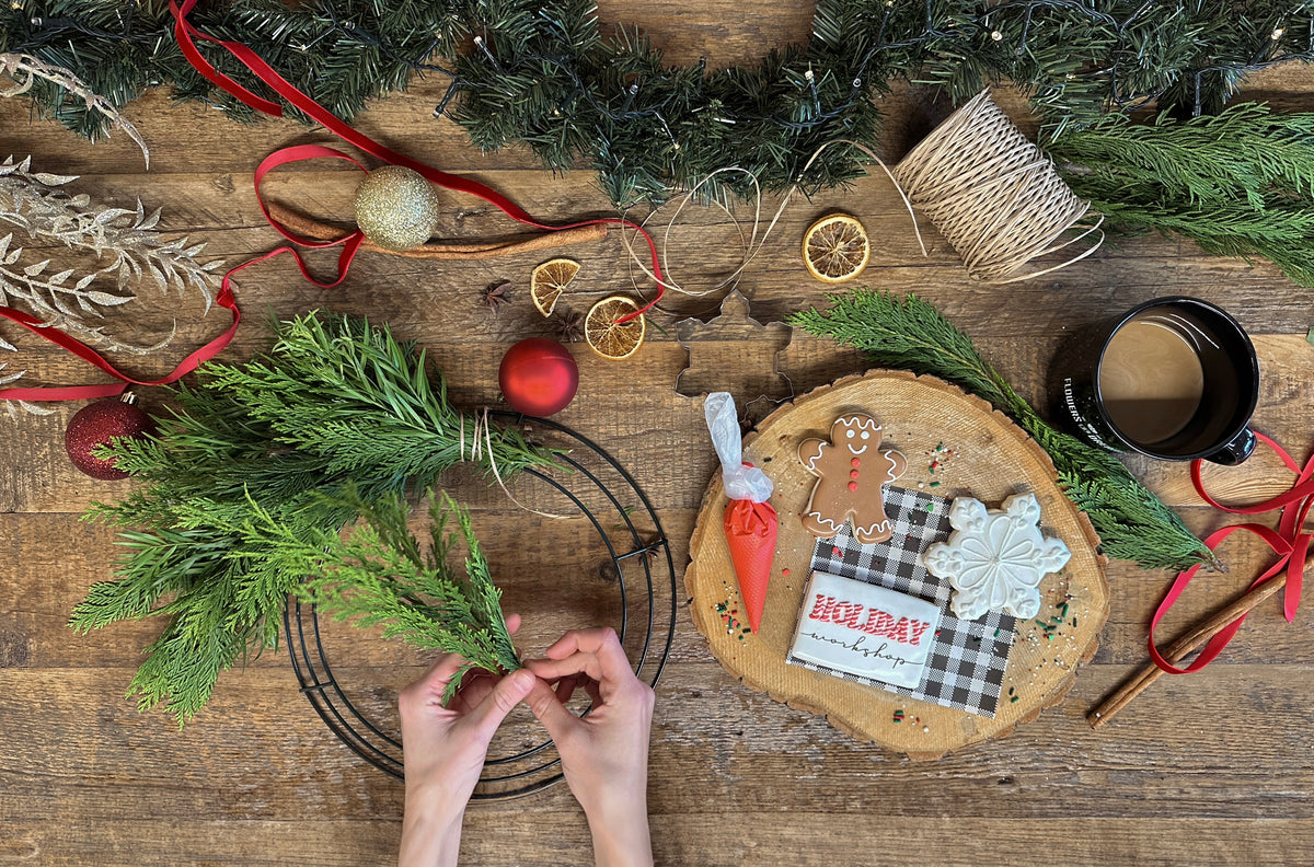 Cozy floral shop wreath-making workshop featuring fresh flowers and LucyBakes baked goods