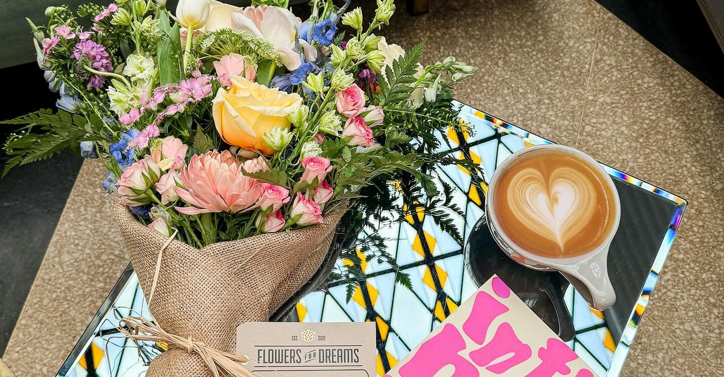  Bouquet from Flowers for Dreams and a card that reads ‘in this house we are feminists’.