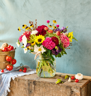 Rustic arrangement featuring fresh, sustainably grown flowers.