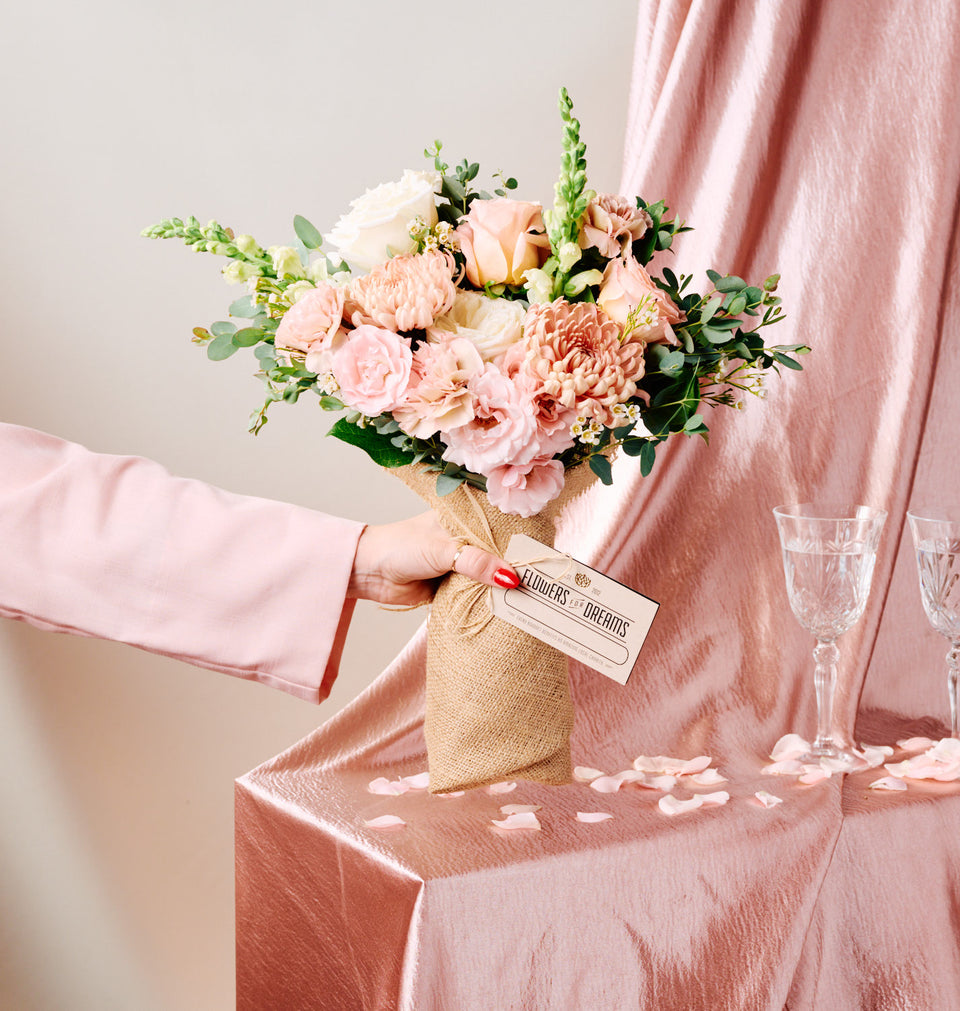 Our local flower shops create this beautiful Blush bouquet for our customers