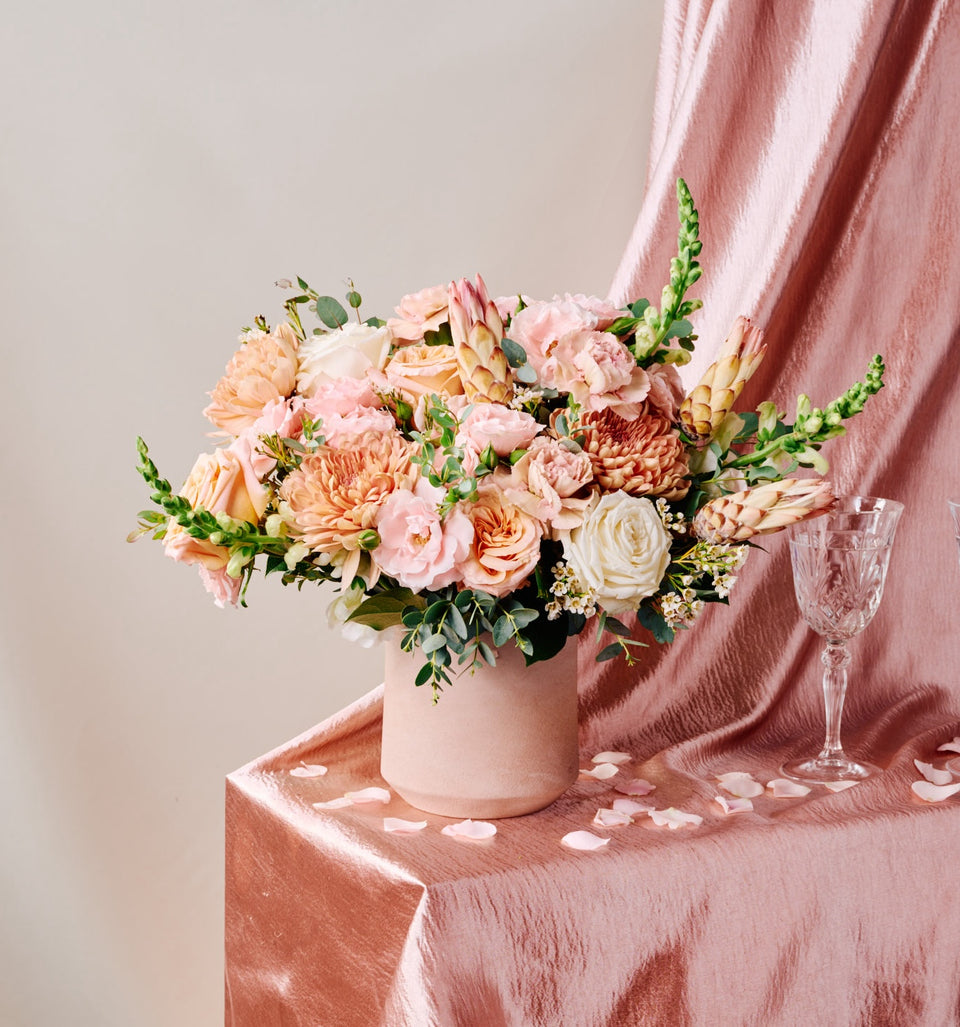 Our local flower shops create this beautiful Blush bouquet for our customers