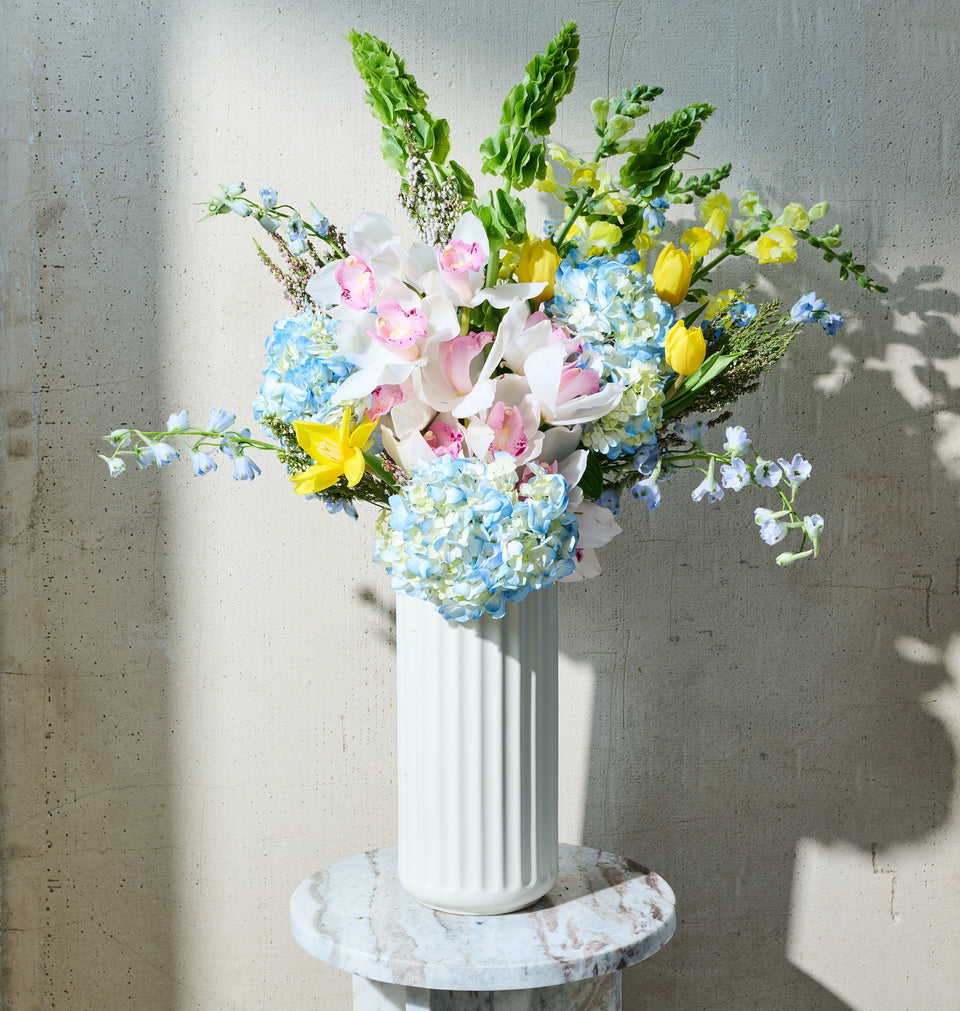 Our local flower shops create this beautiful Sunlight bouquet for our customers