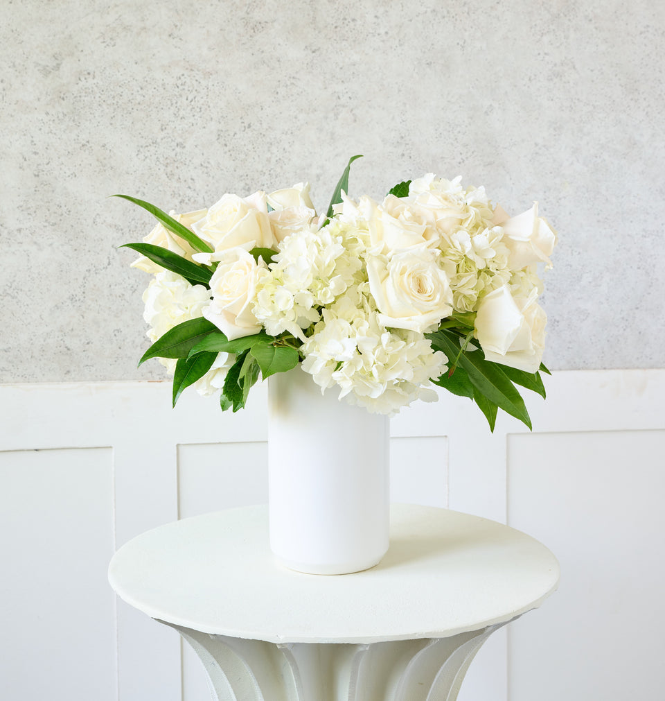 Send our Ivory bouquet of flowers to someone