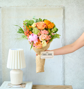 Summery mix of blooms, perfect for warm-weather gifting.