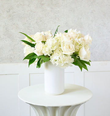 Elegant white bouquet symbolizing purity and conscious beauty.