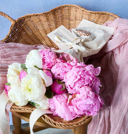 Large peony tote bouquet with full pink blooms