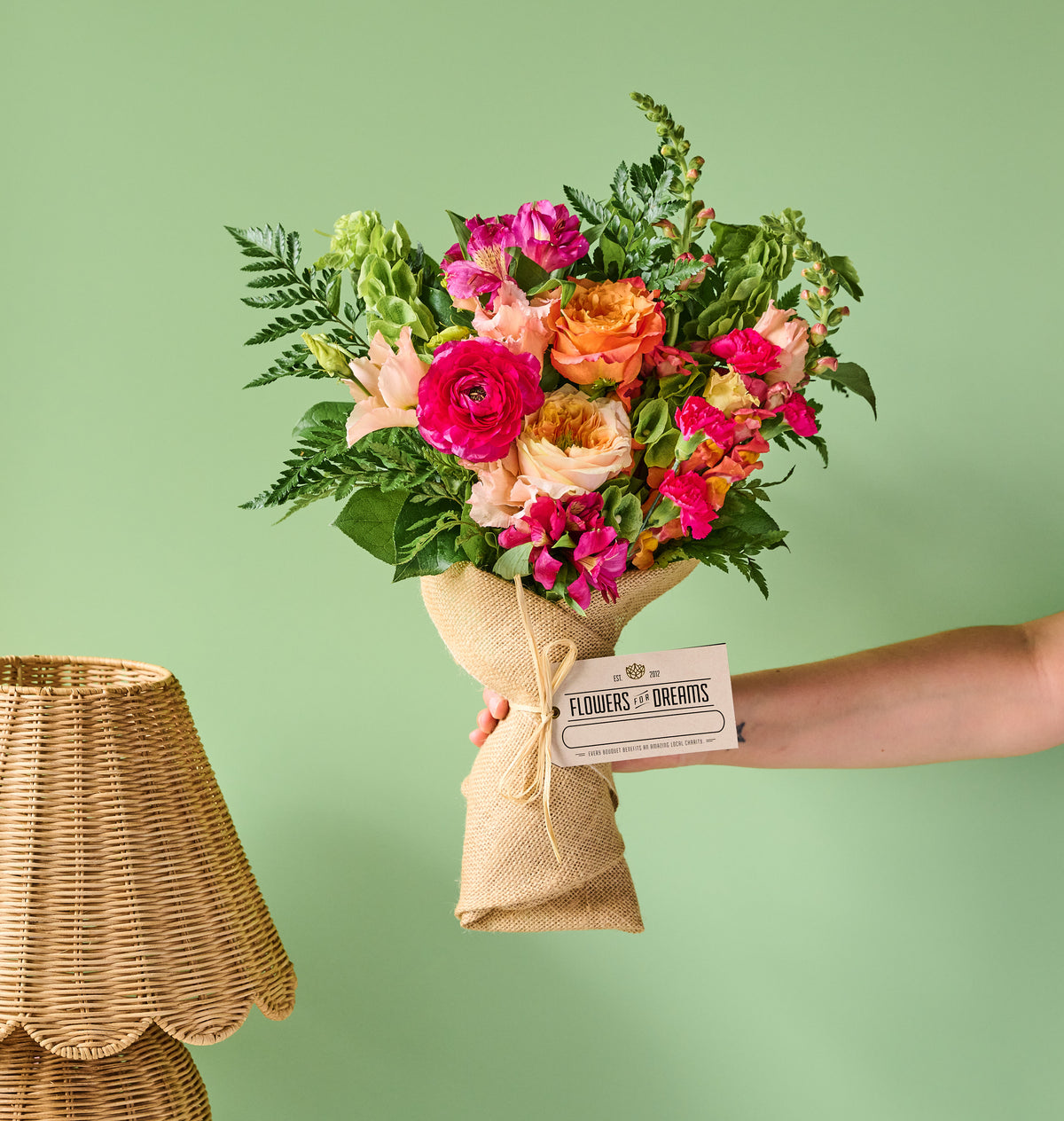 Barry bouquet featuring peach garden roses, blue agapanthus, white chrysanthemums, and seasonal blooms in a handcrafted arrangement inspired by hope and celebration