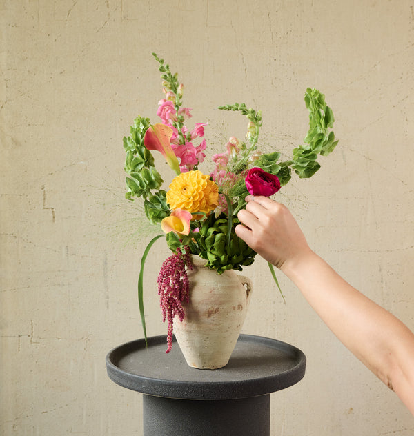Single bunch Artisan arrangement in a ceramic jug, rustic blooms