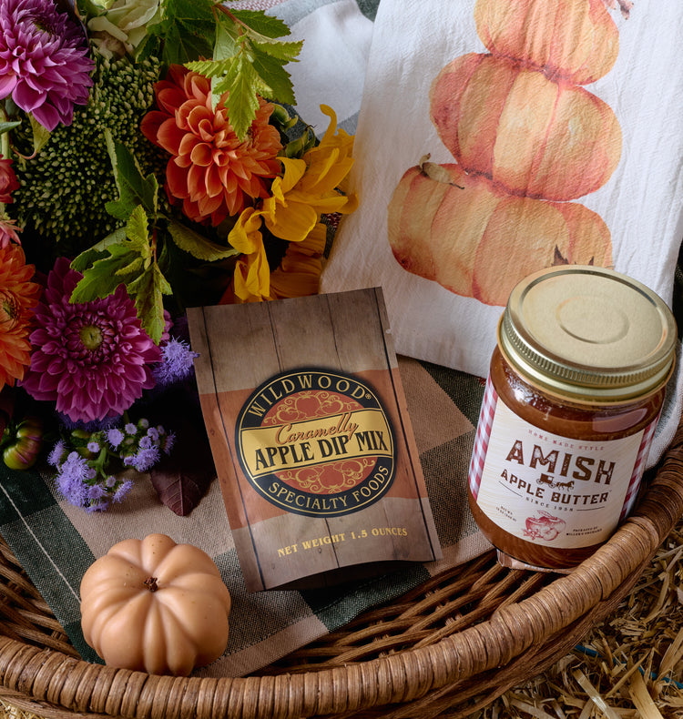 Flowers for Dreams Harvest Bundle gift set flatlay with fall floral arrangement, candle, and seasonal accessories