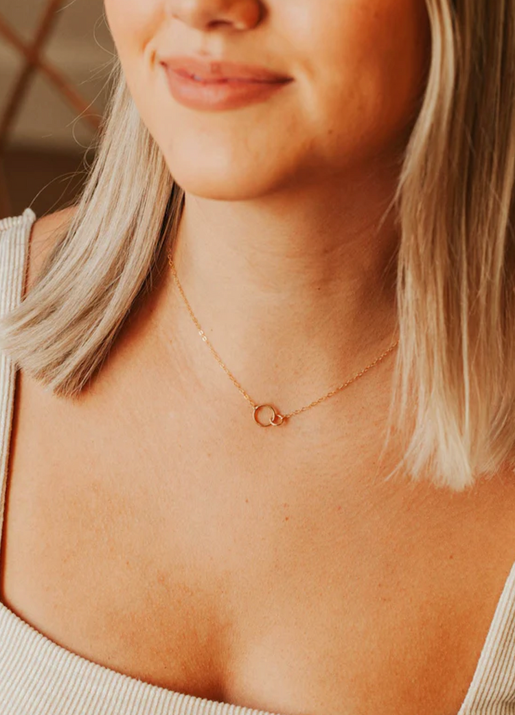 Hello Adorn necklace styled with flowers, Flowers for Dreams gift