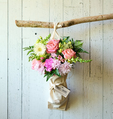 Bright seasonal bouquet with yellow blooms, perfect for surprise gifting.